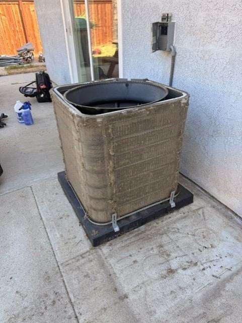 Dirty condenser coil before a deep clean in Murrieta