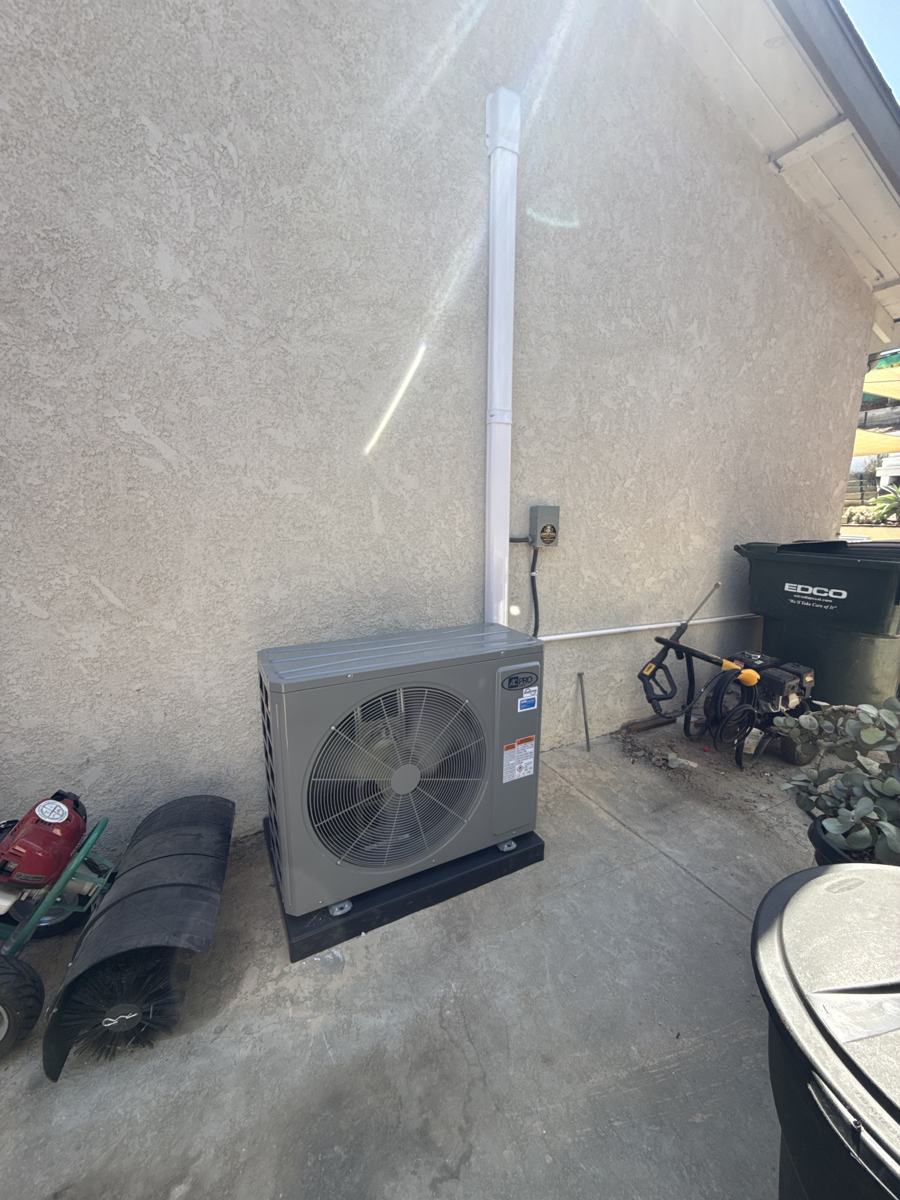 Outdoor unit installed along the side of a Vista home